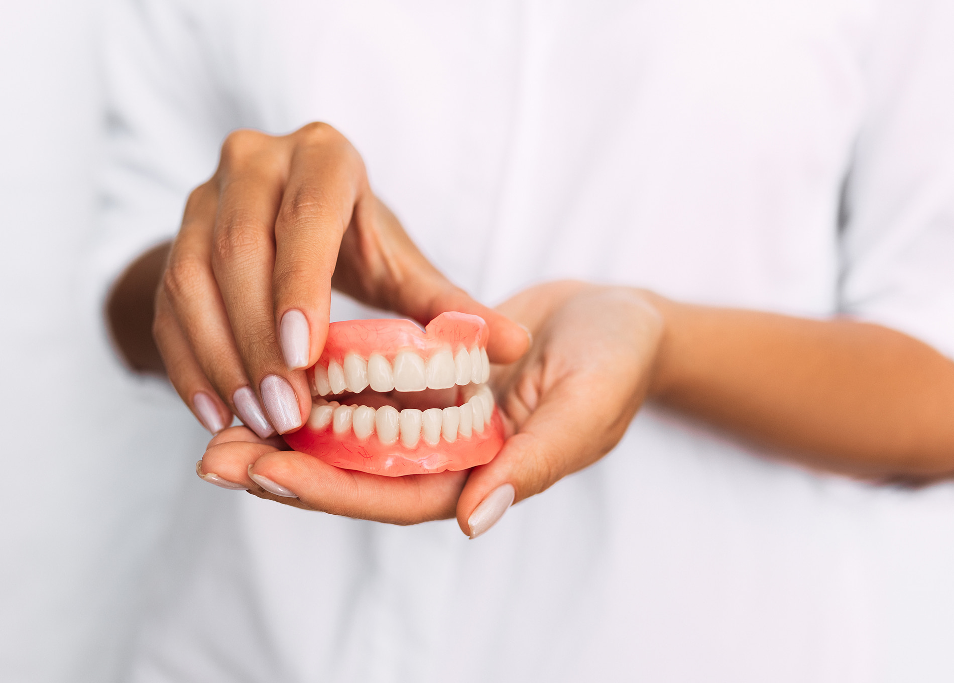 Removable complete dentures restore the function and appearance of your smile